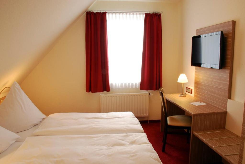 Hotel Muehleneck Schortens Quarto foto
